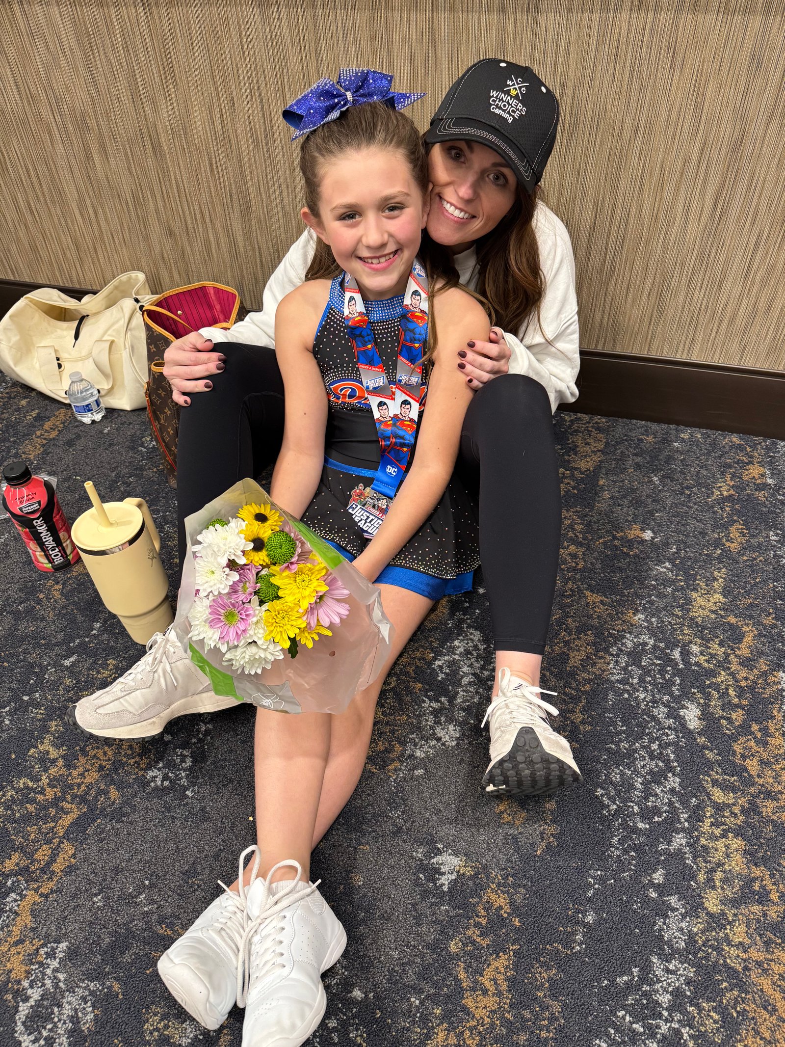 Parent and athlete after competition
